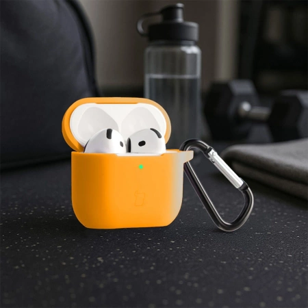 Silikonowe etui z karabińczykiem Bizon Case Headphone Silicone do AirPods 4, marchewkowe